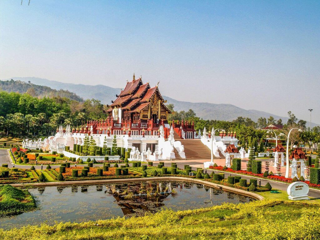Ho Kham Luang Royal Pavilion at Royal Park Rajapruek in Chiang Mai, Thailand, surrounded by traditional Lanna architecture and gardens.