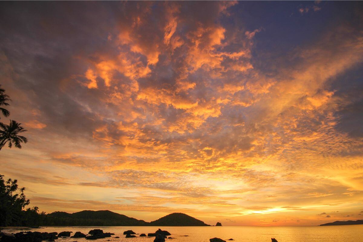 thailand hidden gem beaches koh mak beach at sunset with calm Gulf of Thailand water