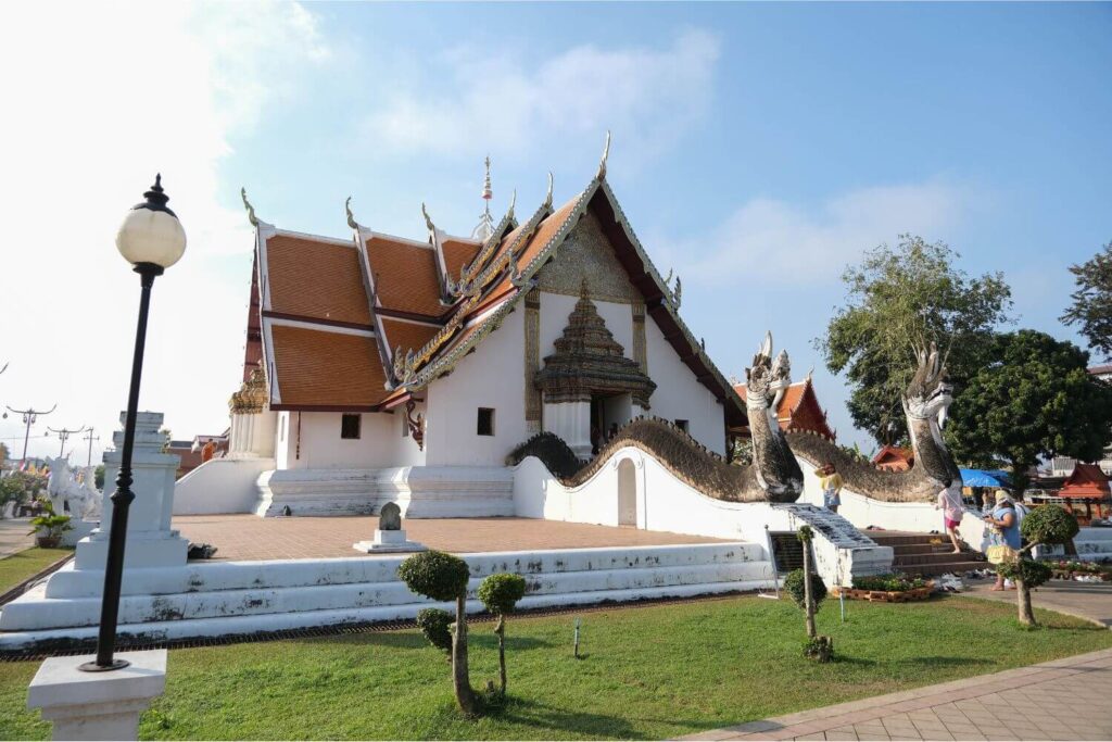 Wat Phu temple Nan Thailand surrounded by trees and local village life