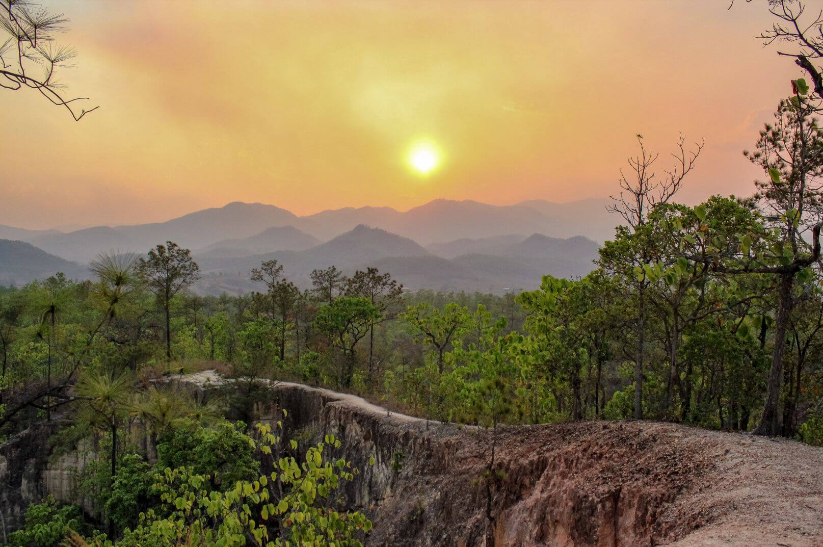 Red-earth canyon ridges at Pai Canyon at sunset, Northern Thailand