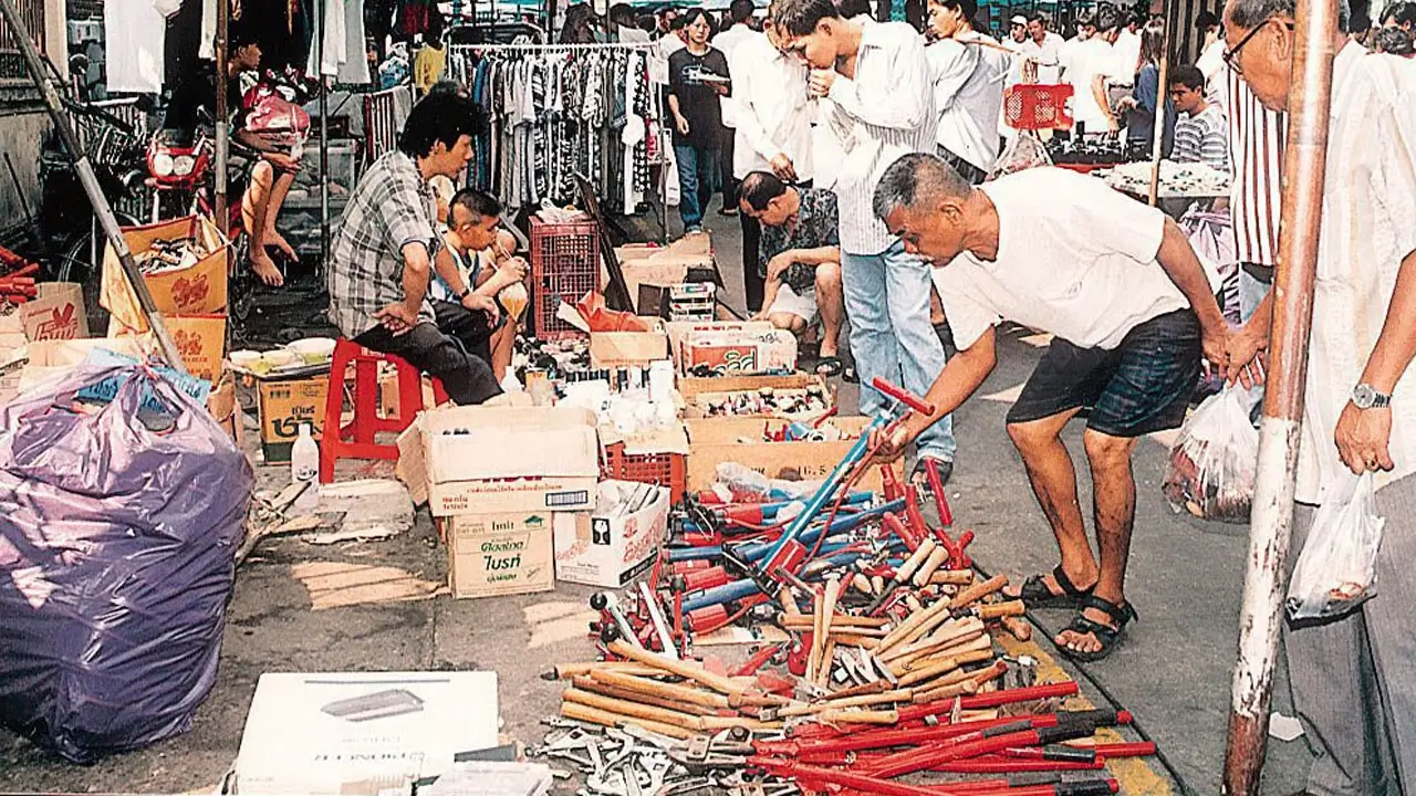 Khlong Thom Market in Bangkok with electronics and tools stalls