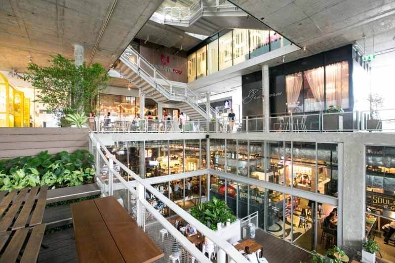 the commons thonglor interior seating quiet cafe space bangkok 2026