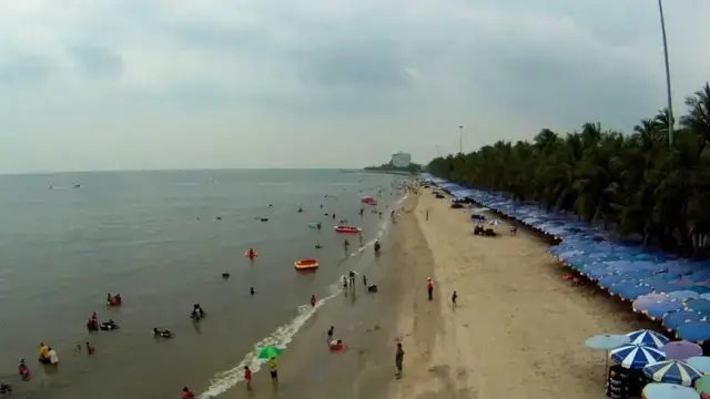 Quiet beach near Bangkok with calm sea and open shoreline, ideal for a weekday day trip