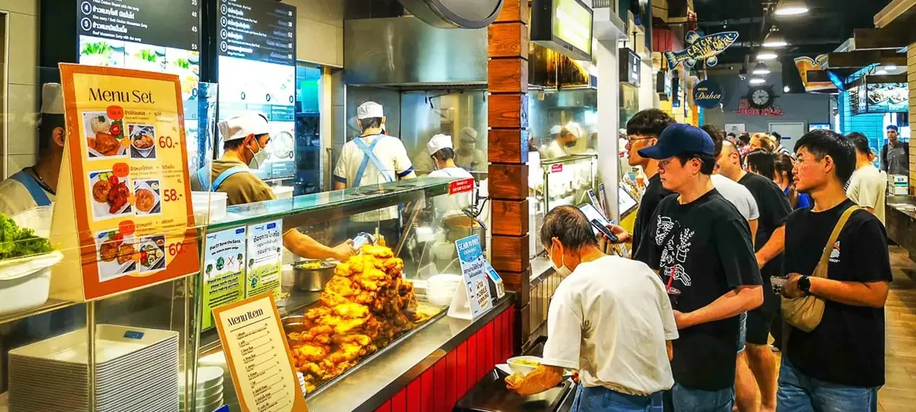 Bangkok budget meal at a supermarket food court with street-food level pricing and clean, standardized seating