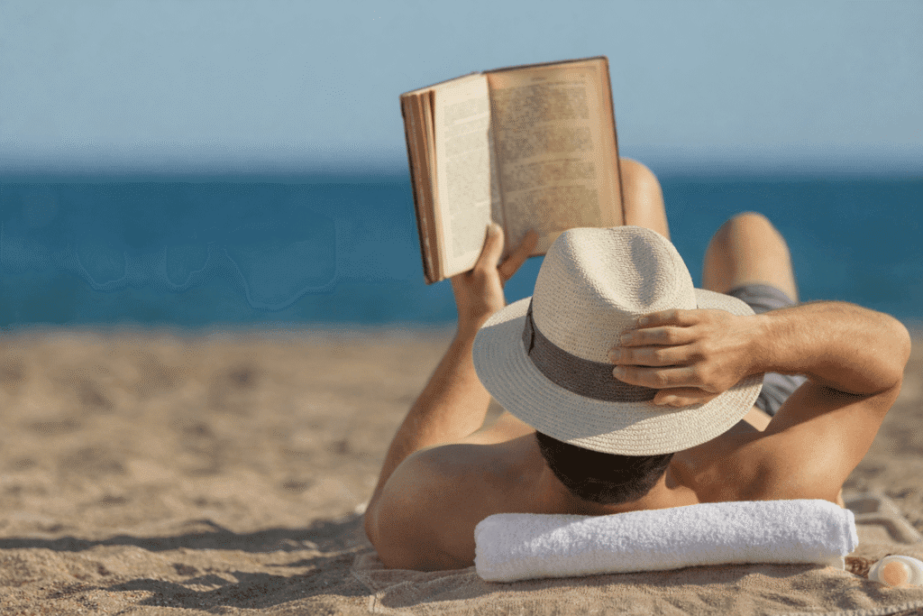off path thailand trip - reading book on beach